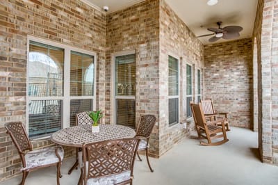 Outdoor seating area with a table and chairs
