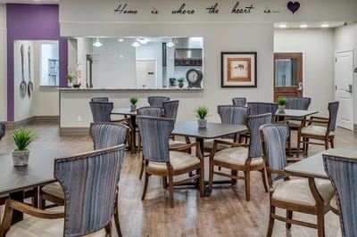 Interior dining area with tables and chairs