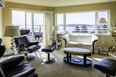 Bright communal living area with large windows