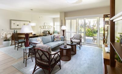 Bright common area with furniture and access to an outdoor space