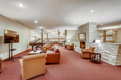 Interior view of a cozy common area with seating