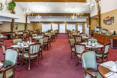 Dining room with tables set for meals