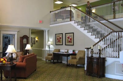 Interior view of a well-lit common area with residents