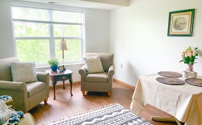 Cozy interior room with seating and table