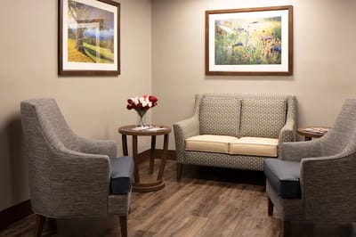Cozy common area with seating and artwork