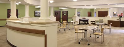 Bright common area with tables and chairs