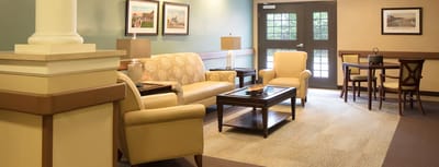 Bright common area with seating and decor
