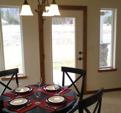 Dining area with table set for a meal