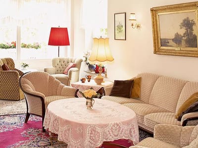 Cozy common area with seating and lamps