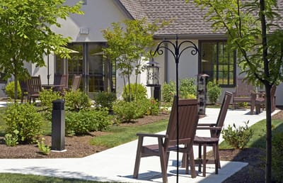 Outdoor seating area with gardens and walkways