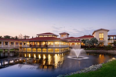 Exterior view of a nursing home facility at twilight