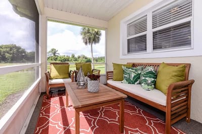 Cozy outdoor seating area with greenery