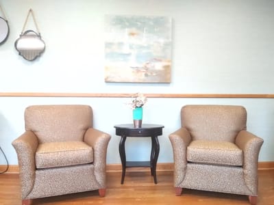 Cozy seating area with armchairs and a table