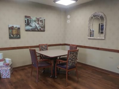 Cozy common area with a table and chairs
