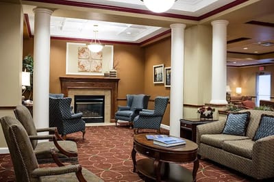 Interior common area with seating and fireplace