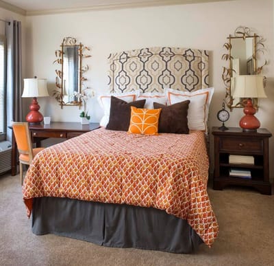 Cozy resident room with a decorated bed