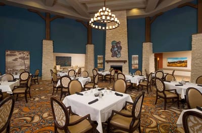 Interior of a dining room with elegant tables and chairs