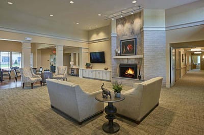 Interior common area with seating and fireplace