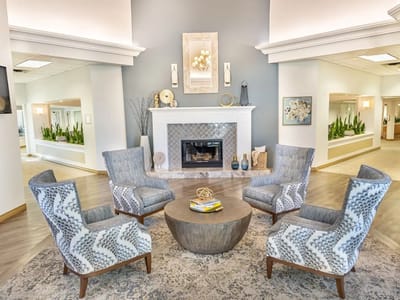 Welcoming common area with seating and a fireplace