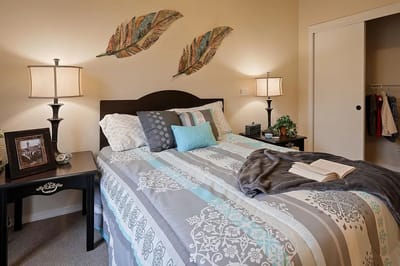 Brightly decorated resident bedroom with personal touches