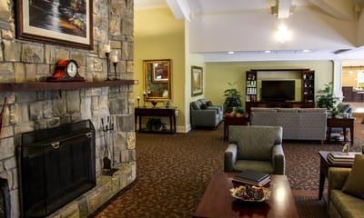 Interior view of a cozy common area with seating