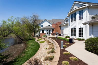 Exterior view of the assisted living facility and gardens