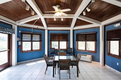 Bright common area with seating and table