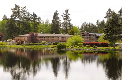 Exterior view of Life Care Center of Federal Way by a lake