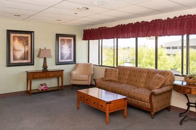 Bright common area with seating and decor