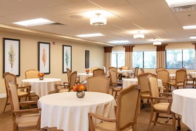 Bright dining room with tables and chairs