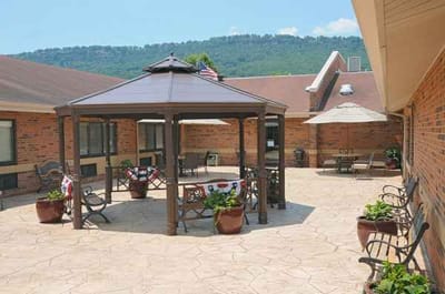 Outdoor patio area with seating and shade structures