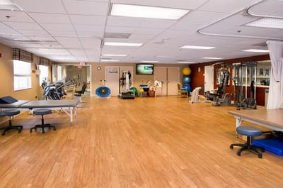 Interior view of a physical therapy room with equipment