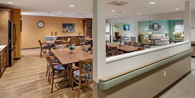 Common area with dining tables and seating