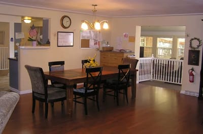 Dining area with a large table and chairs