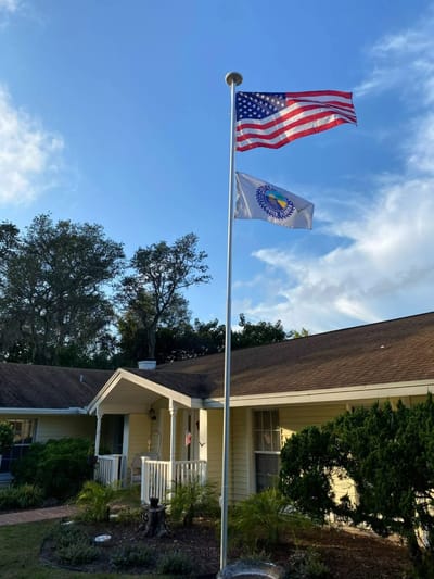 Exterior view of the facility with flags