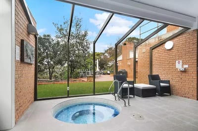 Indoor spa area with a view of the garden