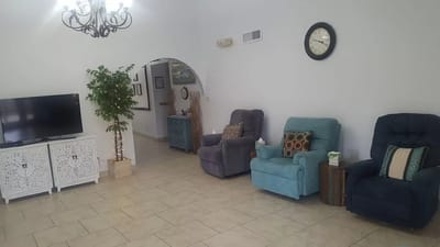Common area with seating and decor in a bright interior