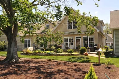 Building exterior with garden and walkway