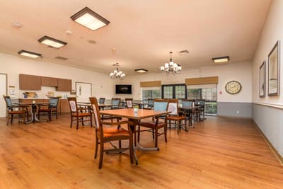 Bright dining area with tables and chairs