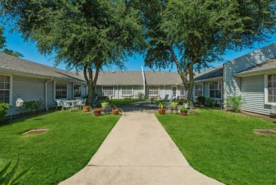 Outdoor courtyard with seating and landscaping