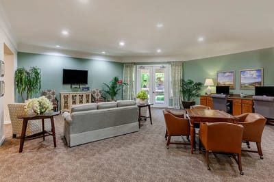 Bright common area with comfortable seating and decor