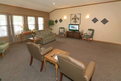 Common area with seating and a television