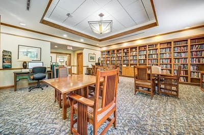 Interior common area with bookshelves and seating