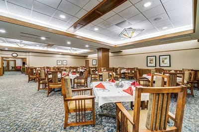 Dining room with tables set for meals