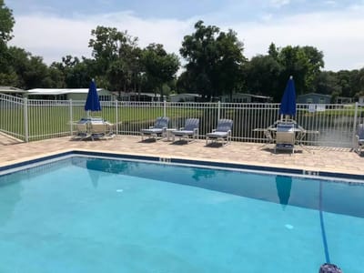 Outdoor swimming pool with lounge chairs