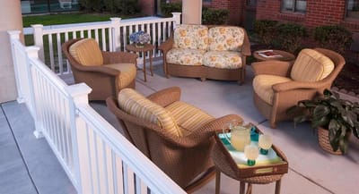 Outdoor seating area with comfortable chairs and table