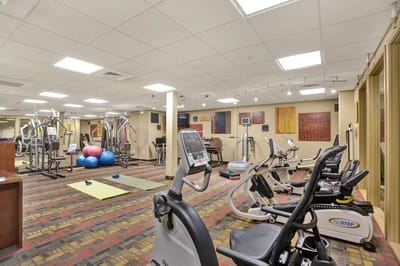 Interior view of a fitness area with exercise equipment