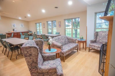 Cozy common area with seating and large windows