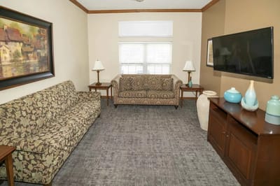 Comfortable common area with seating and decorative elements