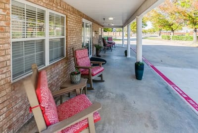 Outdoor seating area with rocking chairs